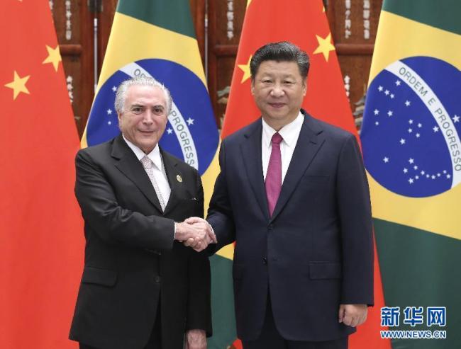 Chinese President Xi Jinping and his Brazilian counterpart Michel Temer meet at the G20 Summit in Hangzhou on September 2, 2016. [Photo: Xinhua]