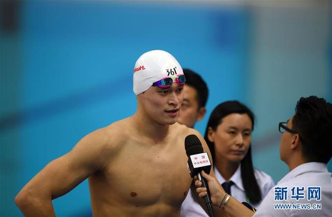 Photo shows Sun Yang speaks in an interview after the race. [Photo: Xinhua]