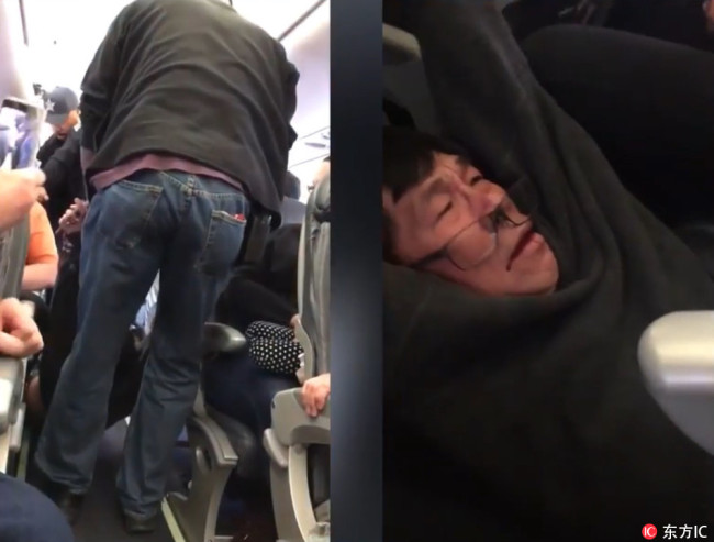 A man is dragged off a United Express flight on April 9, 2017. [File Photo: IC]
