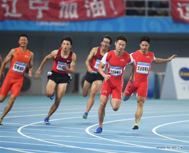 Zhang Peimeng (2nd R) and Su Bingtian (R) of the joint team of Beijing, Zhejiang, Hubei and Guangdong compete during the men's 4×100m relay race final at 13th Chinese National Games in north China's Tianjin Municipality, Sept. 7, 2017. [Photo: Xinhua/Li Xiang]