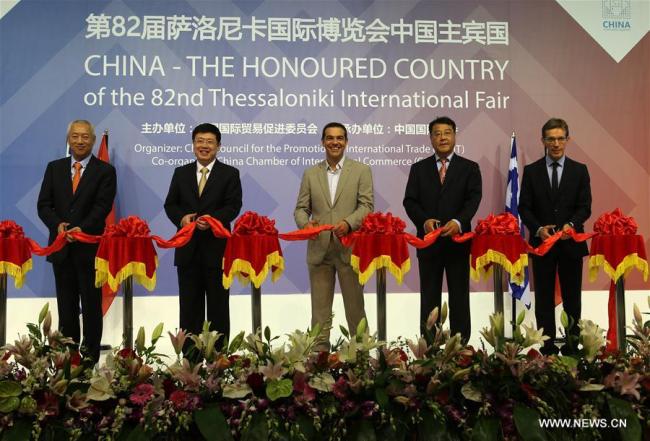 Greek Prime Minister Alexis Tsipras (3rd L), Chinese Ambassador to Greece Zou Xiaoli (2nd L) cut the ribbon for the opening ceremony of the 82nd Thessaloniki International Fair (TIF) in Thessaloniki, Greece on Sept. 9, 2017. China is an honored country this year in TIF, which is Greece's largest and most prestigious annual trade fair. [Photo: Xinhua]