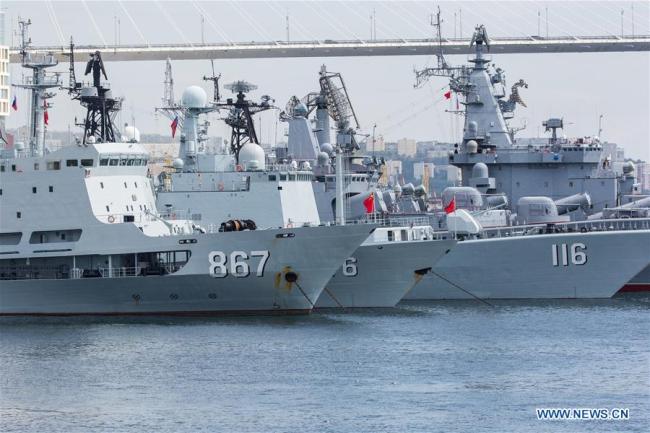 The Chinese naval fleet docks at the port in Vladivostok, Russia, on Sept. 18, 2017. China and Russia started the second stage of their "Joint Sea-2017" military exercises on Monday with the arrival of a Chinese naval fleet in the Russian port city of Vladivostok.[Photo: Xinhua]