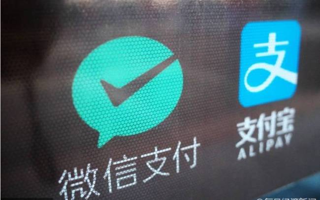  Alibaba and Tencent, china's two giants in mobile payments. [File photo: news.ifeng.com]