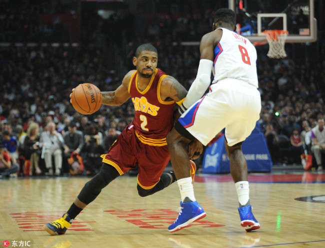 Cleveland Cavaliers guard Kyrie Irving (2) moves to the basket against Los Angeles Clippers forward Jeff Green (8) during the first half at Staples Center in Los Angeles, CA, USA, on March 13, 2016. [File Photo: IC]