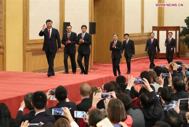 Xi Jinping, general secretary of the Central Committee of the Communist Party of China (CPC), and the other newly-elected members of the Standing Committee of the Political Bureau of the 19th CPC Central Committee Li Keqiang, Li Zhanshu, Wang Yang, Wang Huning, Zhao Leji and Han Zheng arrive to meet the press at the Great Hall of the People in Beijing, capital of China, Oct. 25, 2017. [Photo:Xinhua]