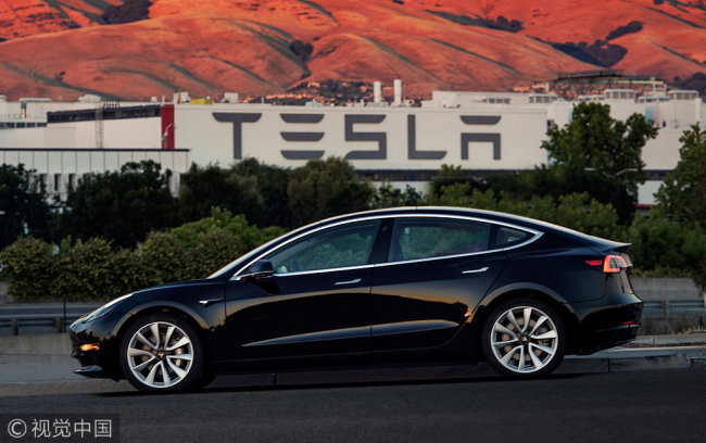 First production model of Tesla Model 3 out the assembly line in Fremont, California , on July 10, 2017. [File photo: VCG ]