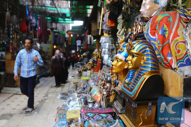 Photo taken on March 15, 2016 shows tourists walking at the Khan el-Khalili bazaar marketplace in Cairo, Egypt.[Photo: Xinhua]