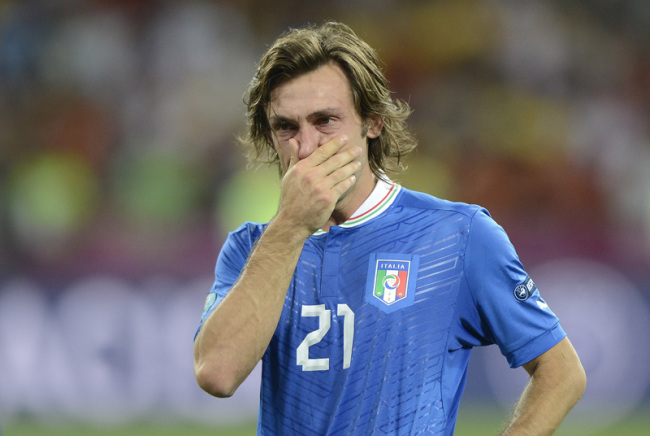 Italy's Andrea Pirlo reacts after Spain defeated Italy 4-0 at the Euro 2012 soccer championship final in Kiev, Ukraine, Sunday, July 1, 2012. [Photo: Xinhua]