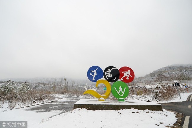 A photo shows the snow-covered landscape of Xiaohaituo Mountain, one of the host sites for the 2022 Winter Olympics, in suburban Beijing's Yanqing district. [File photo: VCG]