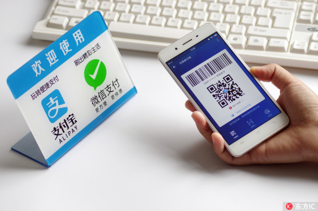 The photo shows logos of Alipay and WeChat Pay. [File photo: IC]