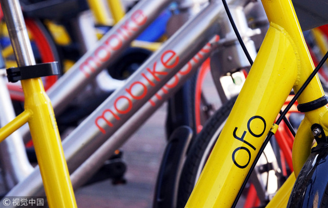 Bikes from Ofo and Mobike parked in Tianjin, March 2, 2017. [File Photo: VCG]