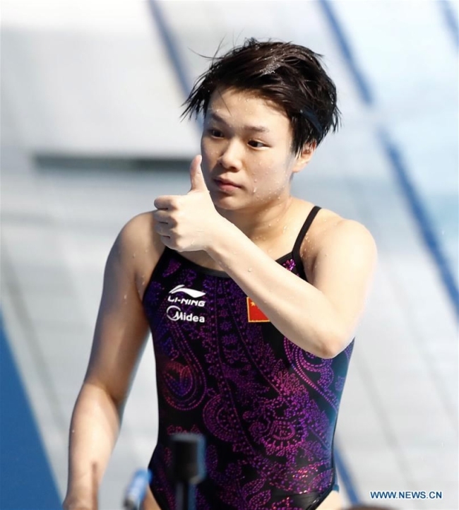 Shi Tingmao gestures during the women's 3m springboard synchronized final of diving at the 17th FINA World Championships in Budapest, Hungary, July 17, 2017. [Photo: Xinhua]