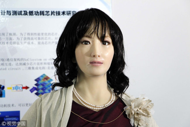 Newly developed emotional robot "Ren Sisi" looks very much like a real woman. [Photo: VCG]