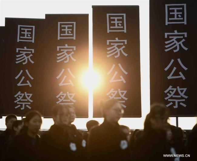 Photo taken on Dec. 13, 2017 shows the scene of state memorial ceremony for China's National Memorial Day for Nanjing Massacre Victims at the memorial hall for the massacre victims in Nanjing, east China's Jiangsu Province, Dec. 13, 2017. [Photo: Xinhua]