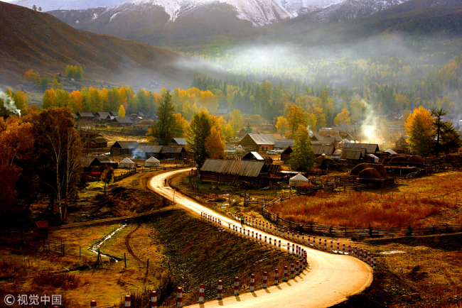 A village in Altay region in Xinjiang [Photo: from VCG] (Xinjiang Uyghur Autonomous Region is located in the northwest of China, with area of 1.66 million square kilometers. Xinjiang is inhabited by more than 40 different ethnic groups, the largest of which are the Uyghur and Han-ethnics. Known as Xiyu in ancient time, “Western Regions” in English, Xinjiang was an important traffic conjunction that leaded to ancient Silk Road.) 