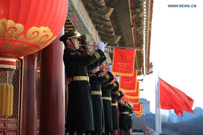 Buglers perform at the national flag-raising ceremony at the Tian'anmen Square in Beijing, capital of China, Jan. 1, 2018. The responsibility for guarding China's national flag and firing salute cannons at the Tian'anmen Square was transferred to the Chinese People's Liberation Army from Jan. 1, 2018, as authorized by the Central Committee of the Communist Party of China. Before Jan. 1, the ceremony was conducted by the armed police. [Photo: Xinhua/Shen Hong]