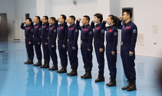 11 Chinese astronauts who have traveled to space repeat the oath they took when they joined the PLA astronaut training battalion, December 4, 2017. [Photo: China Plus/Li Jin]