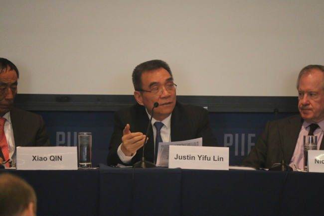 Justin Lin Yifu, professor at National School of Development at Peking University spoke at “The New Era of Chinese Economy and China’s Financial Opening-up”, a forum co-organized by Peterson Institute of International Economics and China Finance 40 Forum in Washington D.C. on January 11, 2018. [Photo: China Plus] 