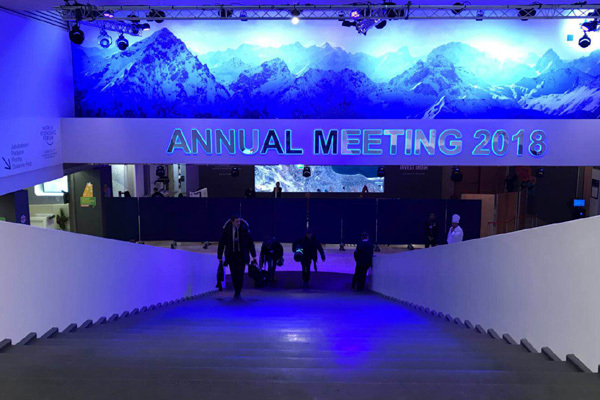 People walk at the venue of the annual meeting of the World Economic Forum in Davos, Switzerland on January 22, 2018. [Photo: China Plus]