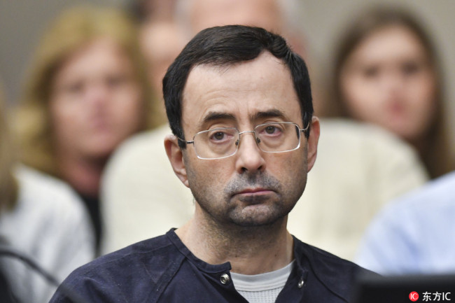 Larry Nassar faces Ingham County Circuit Judge Rosemarie Aquilina just prior to his sentencing. [Photo: IC/ Matthew Dae Smith/Lansing State Journal via USA TODAY NETWORK]