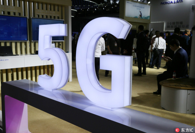 A logo of 5G at a stand during an exhibition in Beijing, China, 27 September 2017. [Photo: IC]