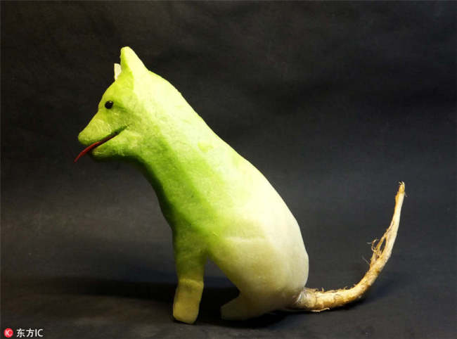 A dog image is made of vegetable. [Photo/IC]