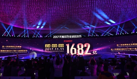 A screen shows the value of goods transacted at Alibaba Group's 11.11 Singles' Day global shopping festival, in Shanghai, east China, Nov. 12, 2017. [Photo: Xinhua]