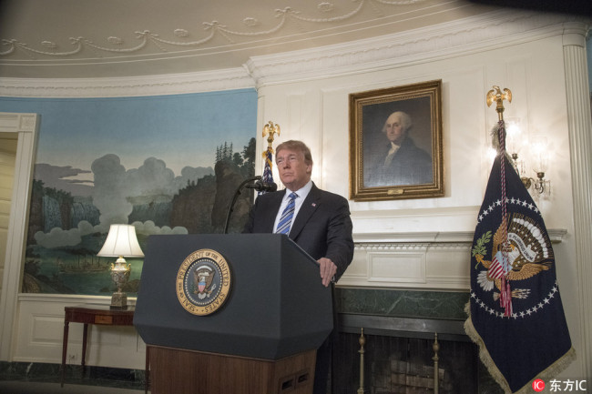 United States President Donald J. Trump addresses the nation on the shootings at the Marjory Stoneman Douglas High School in Parkland, Florida where 17 people died, from the Diplomatic Reception Room of the White House in Washington, DC on Thursday, February 15, 2018. [Photo: IC]