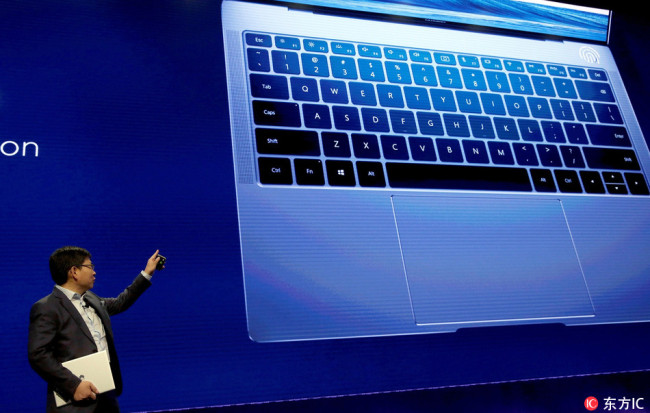 Huawei's CEO, Richard Yu, presents the new Matebook X Pro, on the sidelines of the Mobile World Congress (MWC) in Barcelona, Spain, 25 February 2018. [Photo: IC]