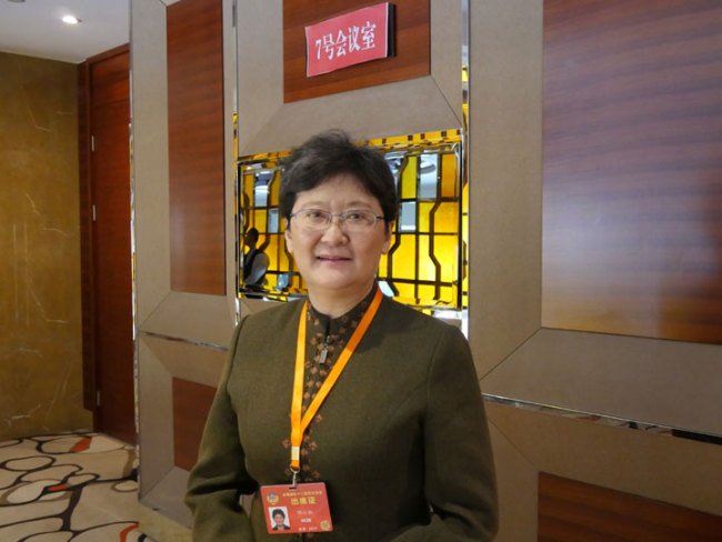 CPPCC member Deng Xiaohong during an interview with China Radio International