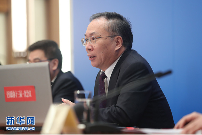 Wang Guoqing, spokesman of the first session of the 13th National Committee of the Chinese People's Political Consultative Conference (CPPCC), attends a press conference at the Great Hall of the People in Beijing on Friday, March 2, 2018. [Photo: Xinhua]