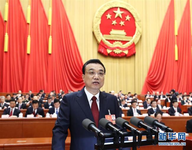 Chinese Premier Li Keqiang delivers a government work report at the opening meeting of the first session of the 13th National People's Congress at the Great Hall of the People in Beijing, capital of China, March 5, 2018. [Photo: Xinhua]