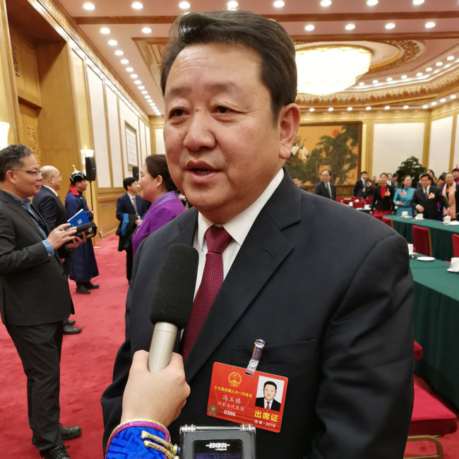 Feng Yuzhen, Inner Mongolian deputy to the 13th National People's Congress (NPC), is interviewed in Beijing, on March 5, 2018. [Photo: China Plus]
