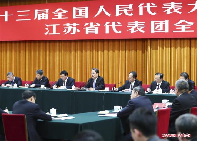 Zhao Leji, a member of the Standing Committee of the Political Bureau of the Communist Party of China (CPC) Central Committee, joins a panel discussion with the deputies from Jiangsu Province at the first session of the 13th National People's Congress in Beijing, capital of China, March 7, 2018. (Xinhua/Xie Huanchi)
