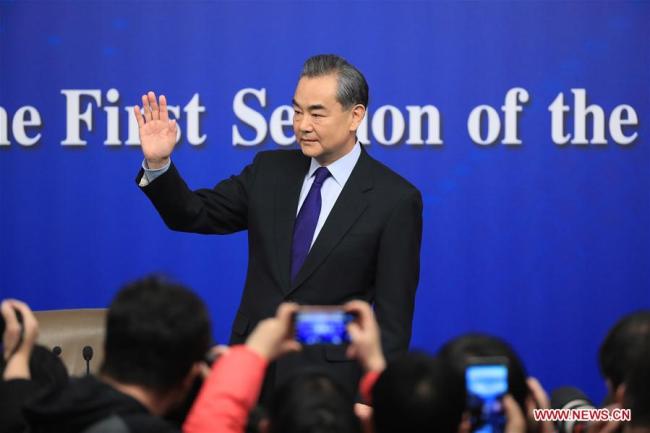 Chinese Foreign Minister Wang Yi attends a press conference on China's foreign policies and foreign relations on the sidelines of the first session of the 13th National People's Congress in Beijing, capital of China, March 8, 2018. [Photo: Xinhua]