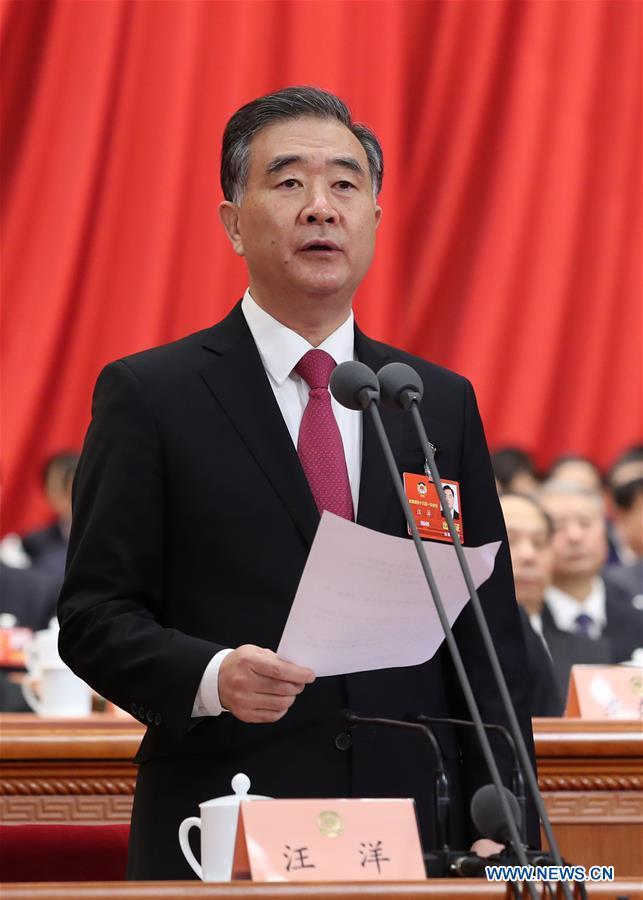 Wang Yang, a member of the Standing Committee of the Political Bureau of the Communist Party of China (CPC) Central Committee and chairman of the National Committee of the Chinese People's Political Consultative Conference (CPPCC), presides over the closing meeting of the First Session of the 13th CPPCC National Committee at the Great Hall of the People in Beijing, capital of China, March 15, 2018. [Photo: Xinhua] 