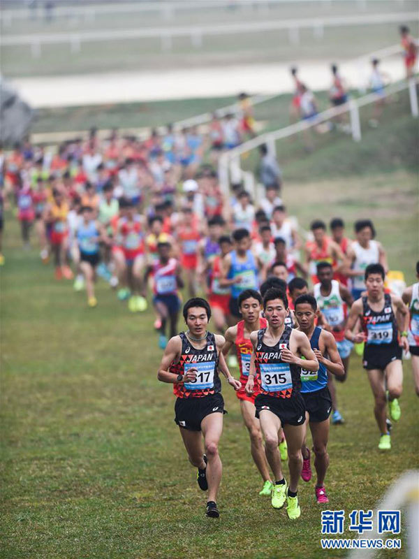 Participants take part in the junior men's 8km event at the 14th Asian Cross Country Championships in Qingzhen, southwest China's Guizhou Province, on March 15, 2018. [Photo: Xinhua/Tao Liang]