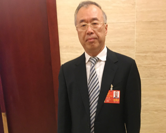 Guo Yonghong, chairman of China Mobile in Chongqing and also a national legislator. [Photo: China Plus]