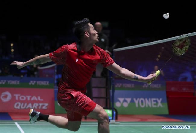 Lin Dan of China returns the shot during the men's singles quarterfinal with Lee Chong Wei of Malaysia at All England Open Badminton Championships 2018 in Birmingham, Britain on March 16, 2018. Lin Dan won 2-0 and advanced to the semifinal. (Xinhua/Han Yan)