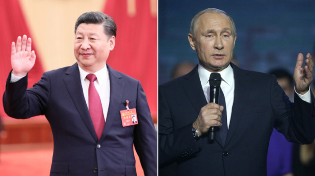Chinese president Xi Jinping (L) and Vladimir Putin (R)