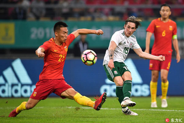 Wales thrashes hosts China 6-0 in the opener of the 2018 China Cup International Football Championship in Nanning, southwest China's Guangxi Zhuang Autonomous Region, on March 22, 2018. [Photo: Imagine China]