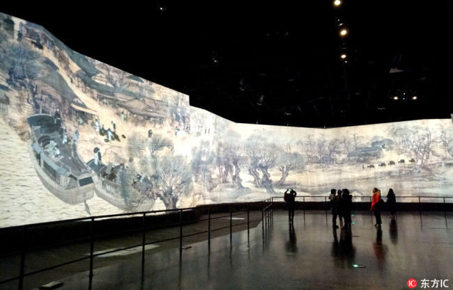 Digital version of Along the River during the Qingming Festival was exhibited in the China Arts Museum in Shanghai on Feb. 24 2018. [Photo: from IC]