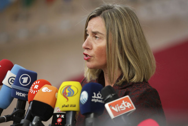 European Union foreign policy chief Federica Mogherini speaks with the media as she arrives for an EU summit at the Europa building in Brussels on Thursday, March 22, 2018. [Photo: AP/Olivier Matthys]