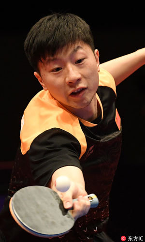 Chinese table tennis athlete Ma Long competes during the men's singles final at the ITTF World Tour German Open on March 25, 2018. [Photo: Imagine China]