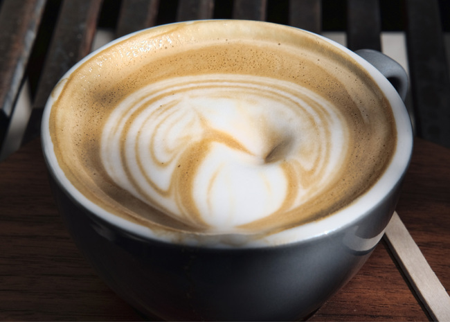 Milk foam floats on a cup of coffee at a Starbucks in Los Angeles on Thursday, March 29, 2018. [Photo: AP/Richard Vogel]