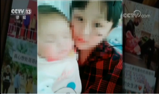 A screenshot from an online video of a teen mother with her baby. [File photo: cctv.com]