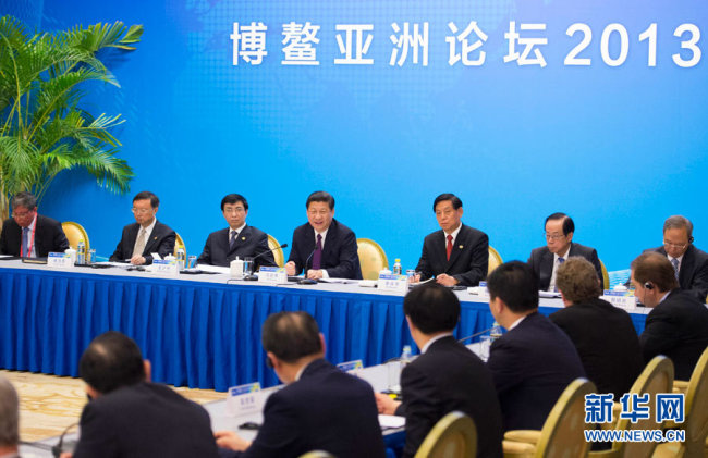 Chinese President Xi Jinping attend a discussion with Chinese and international business leaders at the Boao Forum for Asia in April 2013. [Photo: Xinhua]