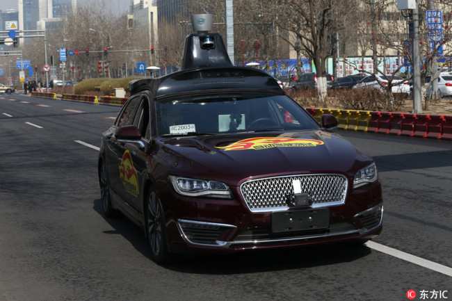 A Baidu self-driving vehicle is tested on a public road in Beijing on March 22, 2018. [File photo: IC]