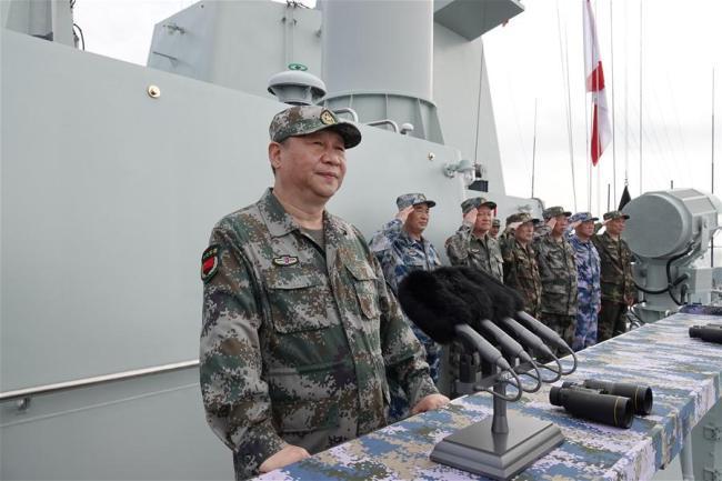 Chinese President Xi Jinping, also general secretary of the Communist Party of China Central Committee and chairman of the Central Military Commission, reviews the Chinese People's Liberation Army (PLA) Navy in the South China Sea on April 12, 2018. [Photo: Xinhua]