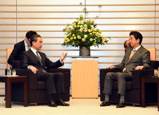 Chinese State Councilor and Foreign Minister Wang Yi met with Japanese Prime Minister Shinzo Abe in Tokyo on Apr. 16th, 2018. [Photo: fmprc.gov.cn]